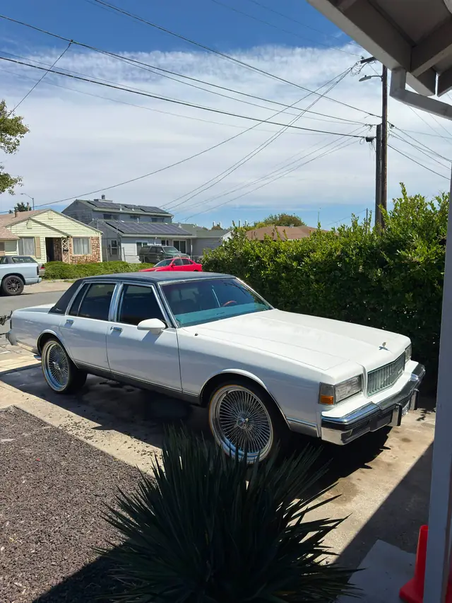 White classic sedan with a clean polished exterior