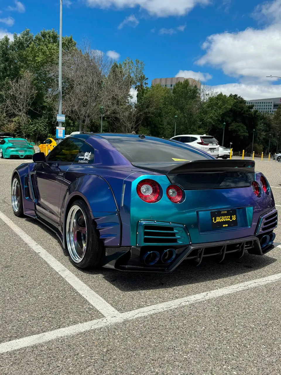 Blue performance coupe with a glossy detailed finish