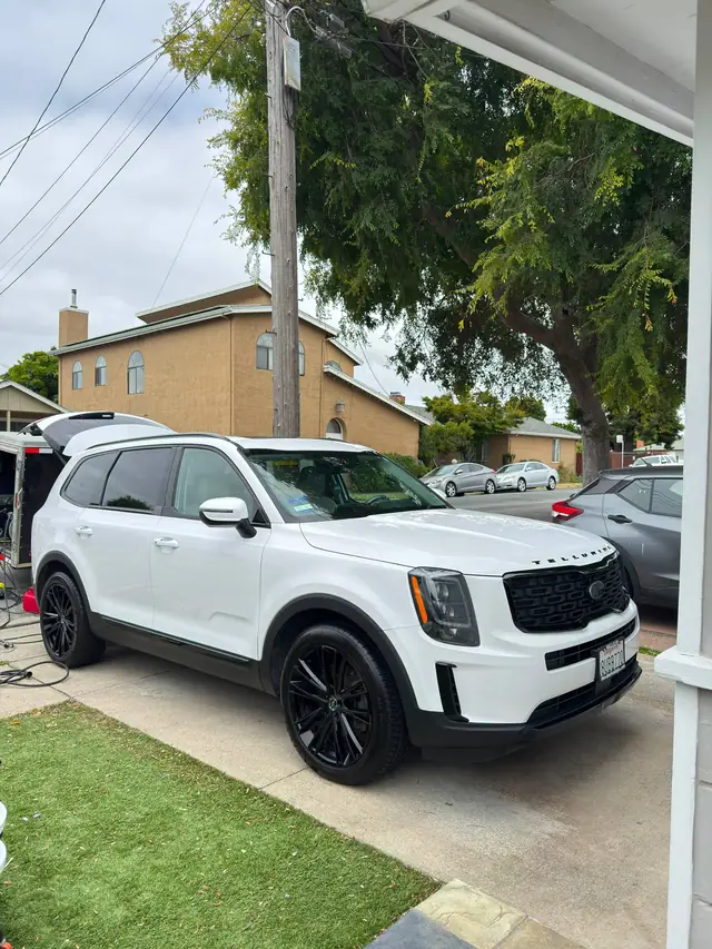 White premium SUV with a freshly detailed exterior