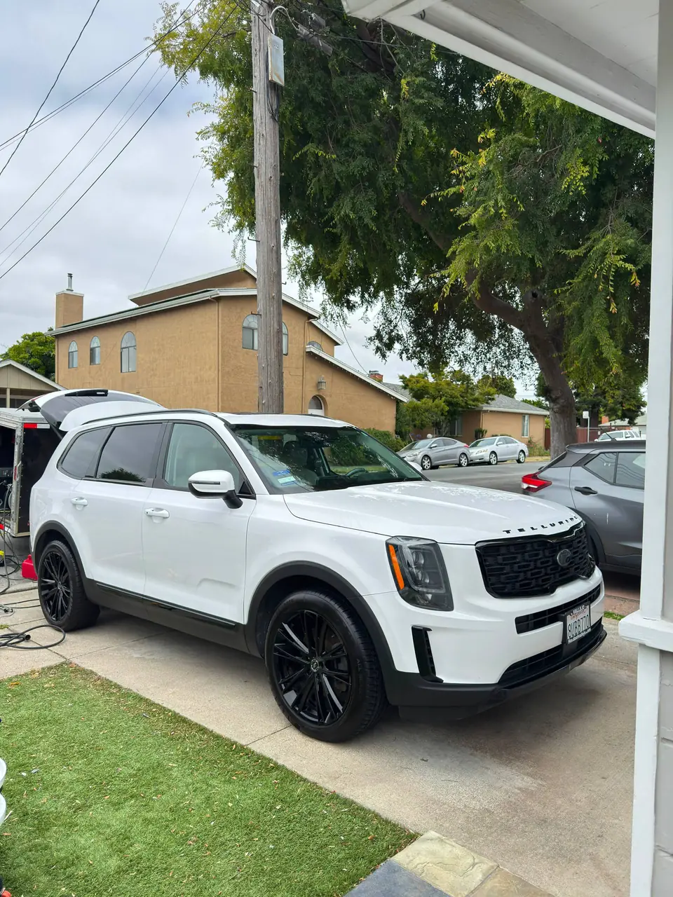JBS Detailing mobile service setup beside a customer vehicle