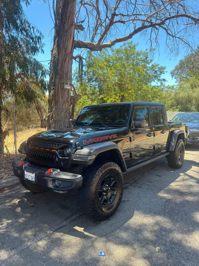 Black off-road pickup after professional exterior care